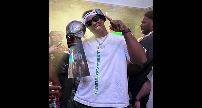 Local football player makes it to top and has the ring to prove it