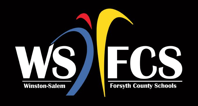 School district moving forward with plan to cut positions